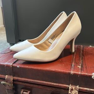 White, simple, classic, and elegant heels.